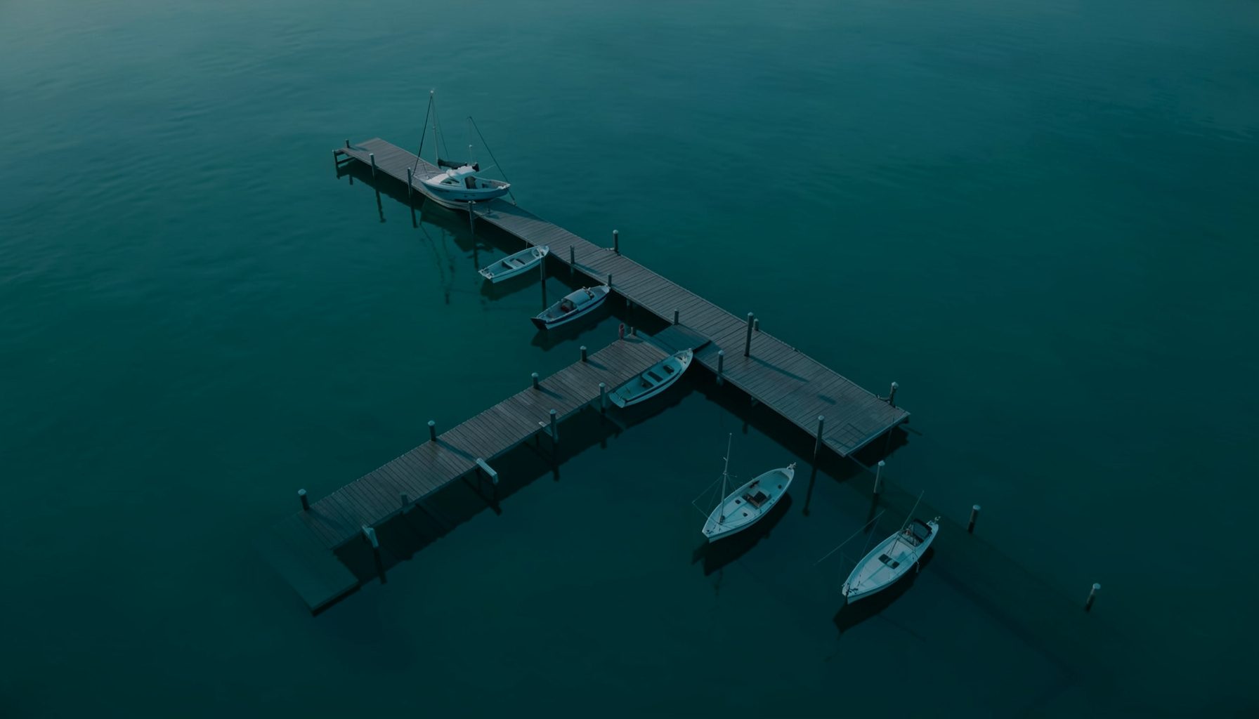 Dark teal marina at dawn with calm water and a dock extending toward moored boats, rendered as a moody isometric illustration in charcoal and cyan tones.